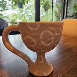 Decorative clay cup