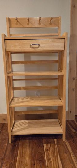 Wooden shelving unit with key hooks