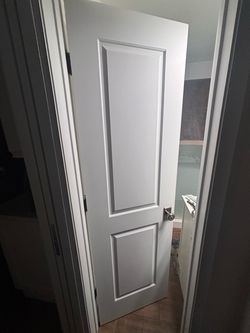 Solid Interior Door with Expensive Chrome Hardware (24” wide x 79” tall)