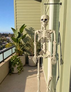Hanging Halloween Decor Skeleton With Red LED Light Up Eyes - Batteries Included
