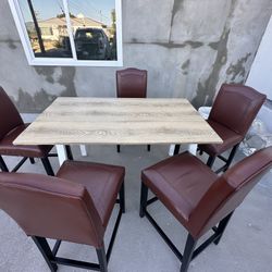 5 chairs and table