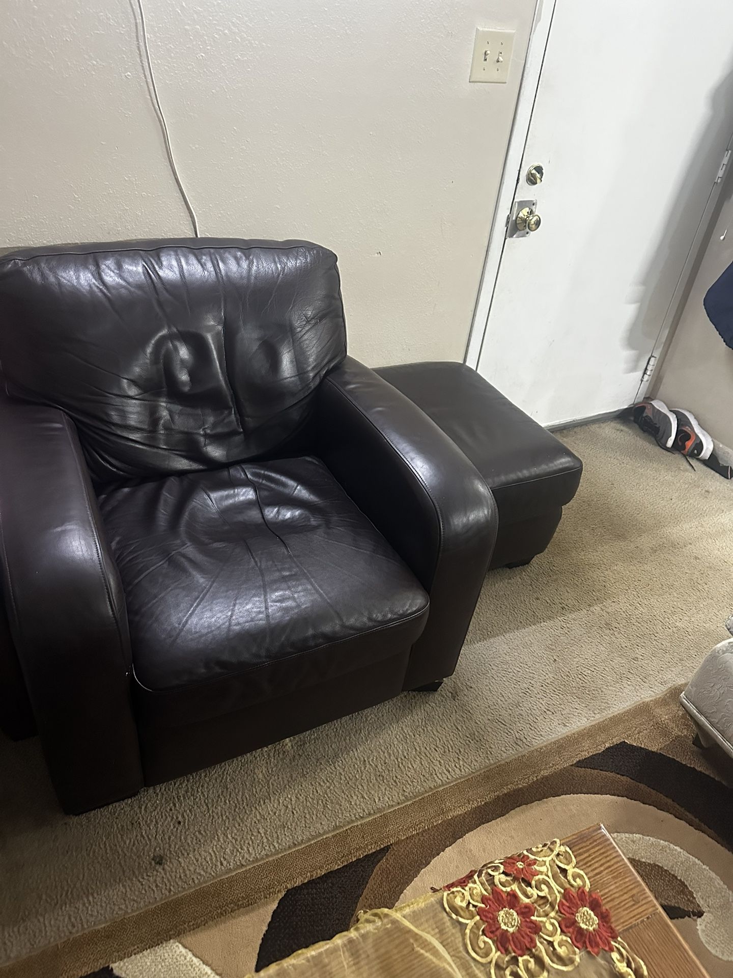 Brown Leather Chair And Ottoman 
