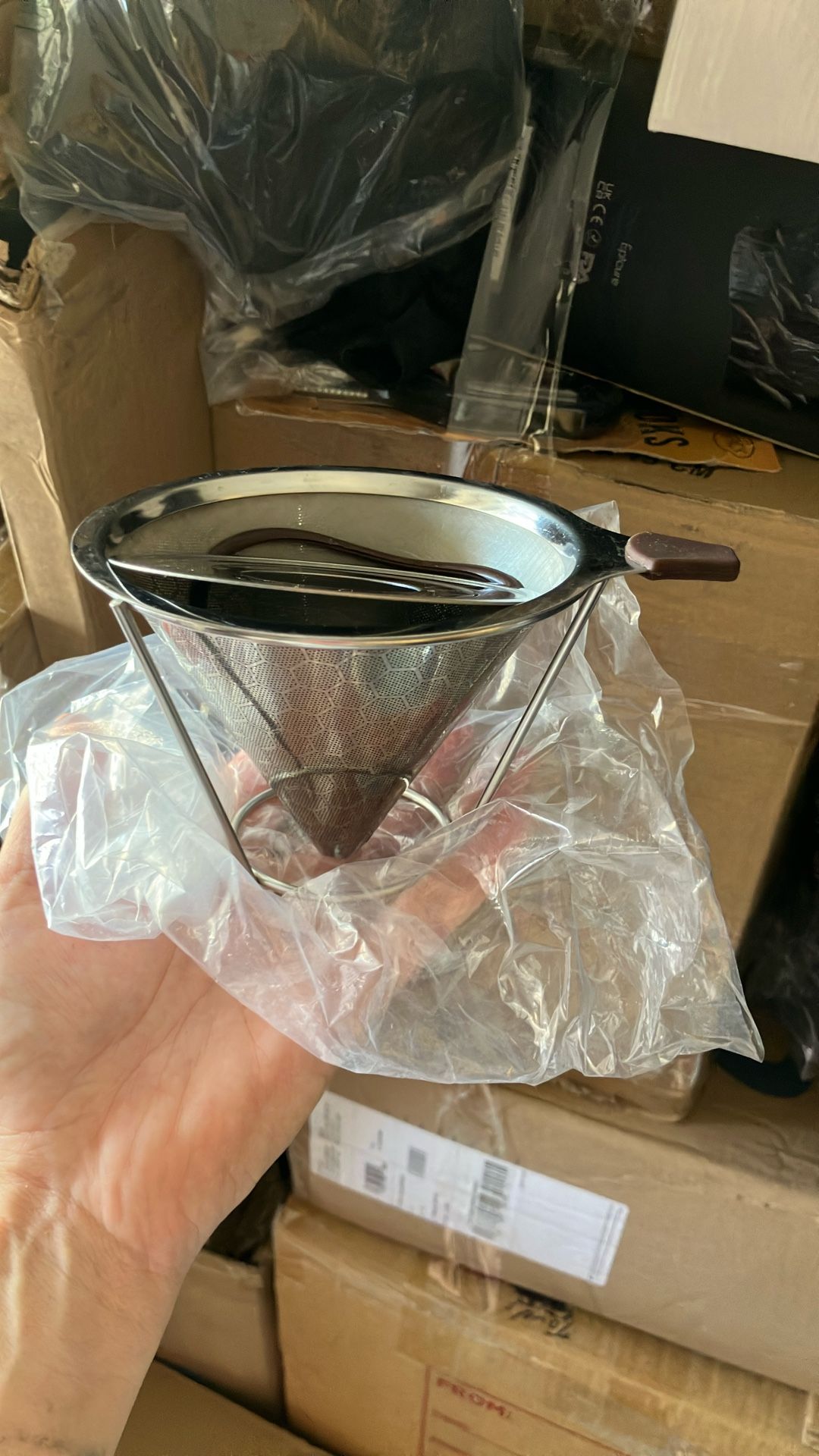 The image shows a double-layered stainless steel coffee dripper, also known as a pour-over coffee filter or cone.