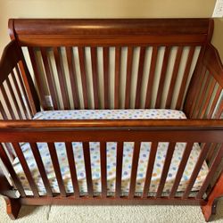 Brown Wood Crib With Mattress