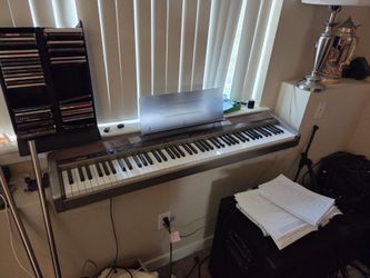 Casio Privia PX-100 88-Key Digital Piano (Includes Power Supply and Sustain Pedal)