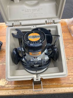 Router with case and bushing guides
