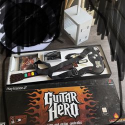 $4 Guitar Hero & Game Rack 