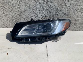 Lincoln Continental Left Driver Headlight