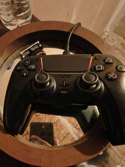PlayStation 5 wireless controller with I Xbox