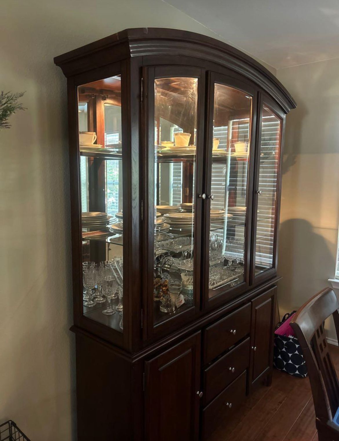 dining room table and china cabinet ; basketball court 