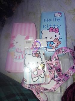 2 brand new original hello kitty wallets with 2 hello kitty id holders