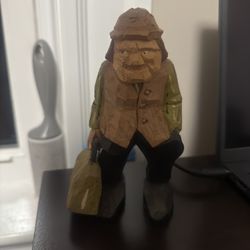 Hand carved wooden statuette