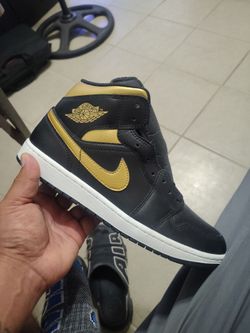 Air Jordan 1 High Black and Gold Sneaker