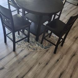 Counter height Round Table With Four Leather Chairs