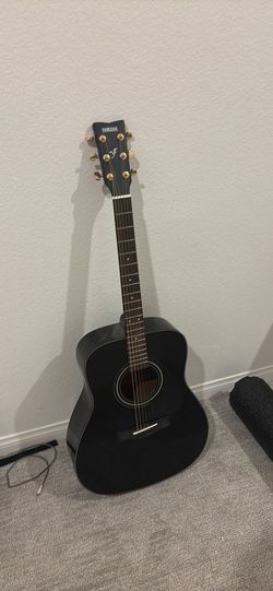 Black Yamaha guitar
