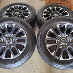 20 inch rims Stock rims and tires TOYOTA TUNDRA all matching  YOKOHAMA  GEOLANDAR X-CV 265/60/20 BRAND NEW RIMS AND TIRES from a 23 Tundra rines