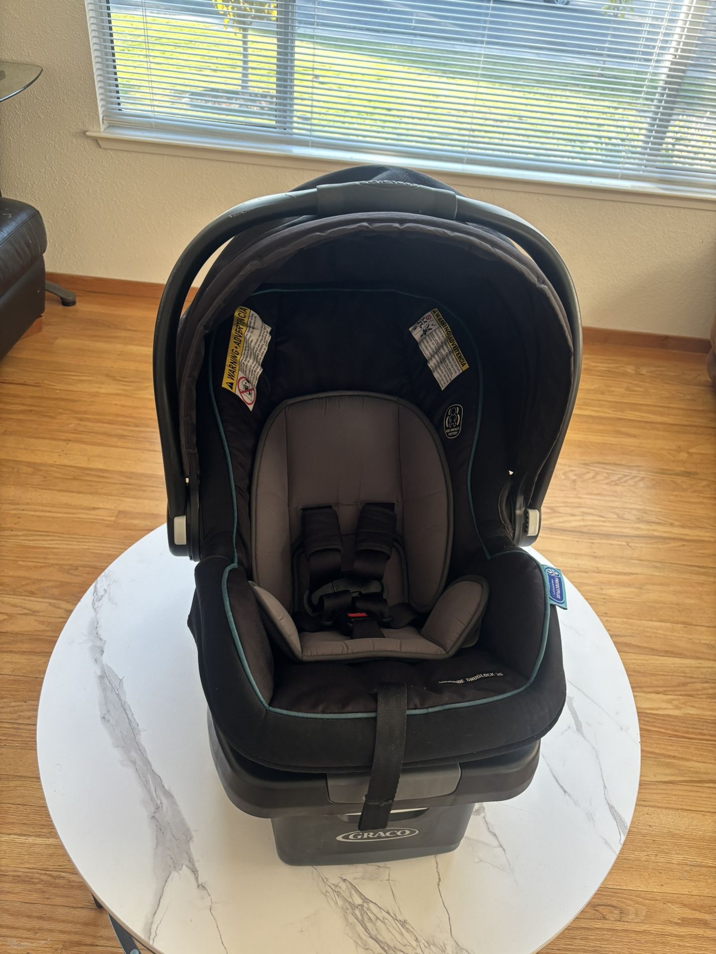 Snugride sluglock 35 graco Car seat **Open to Negotiation