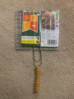 NEW packaged   barbecue grill with a wooden handle