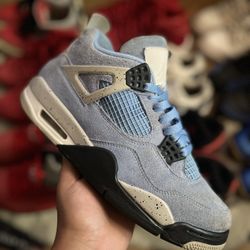 Jordan Retro 4 “University Blue” - Size 7.5M