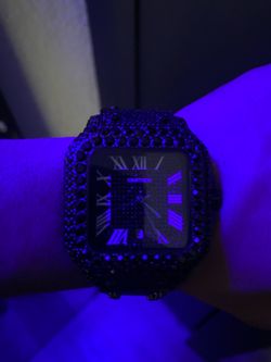 Cartiers black diamond moissanite watch comes with extra links