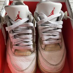 Nike Air Jordan 4 Retro "White Oreo" sneakers.