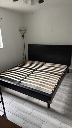 Giving away King size bedframe