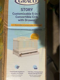 Baby crib with drawers