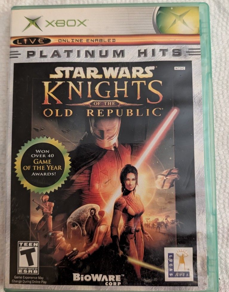 XBox Platinum Hits - Star Wars Knights Of The Old Republic. Game Has A Mirror Image. For Teens, Comes With Guide Book. 2004 Bioware, Adventure, Action
