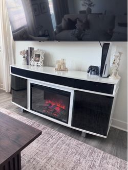 Tv stand with built in speaker/fireplace