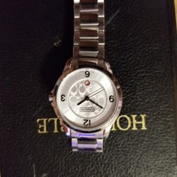 Women silver coach wrist watch,good condition,will fit a wrist 7"+