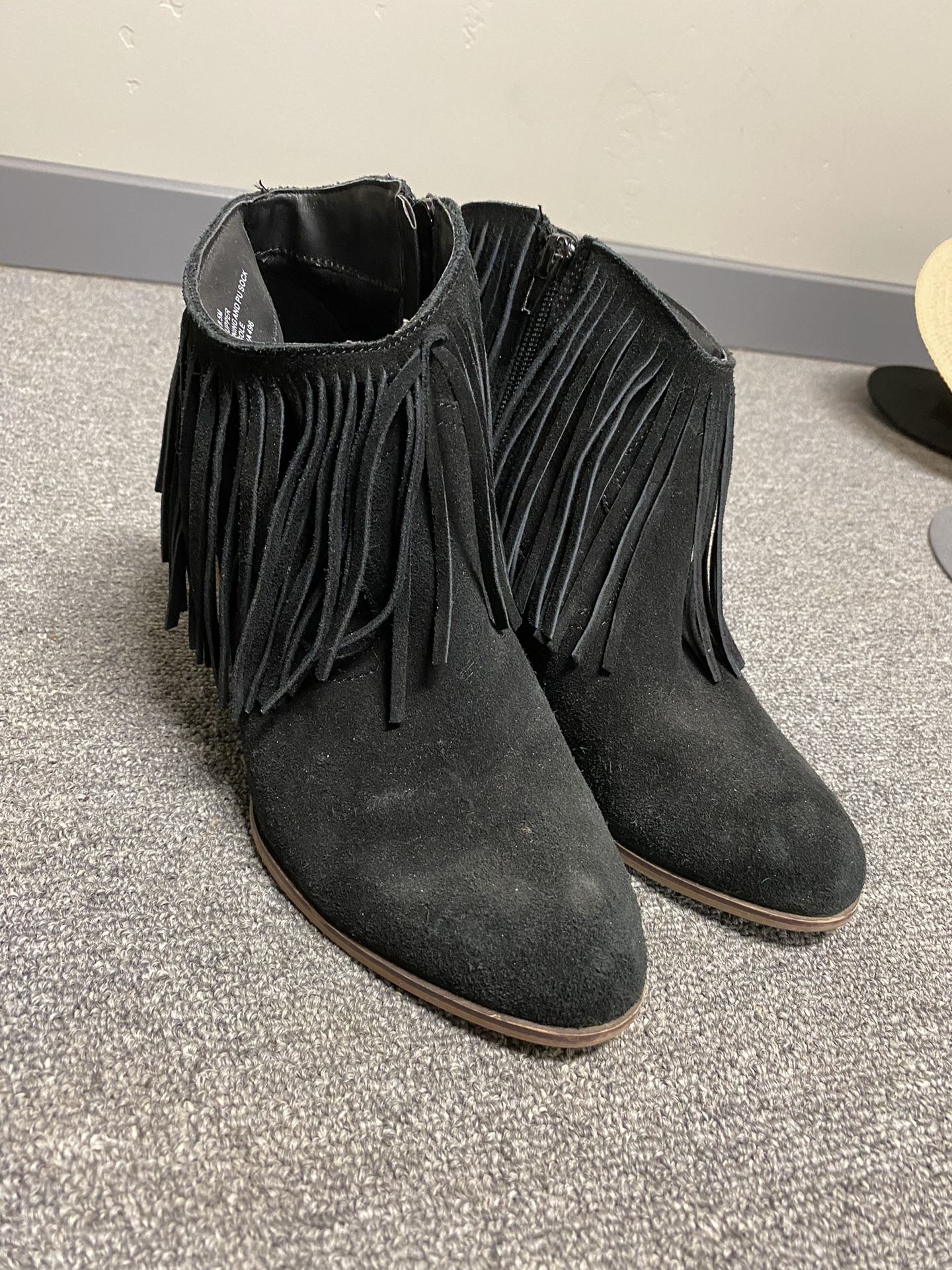 Woman’s Black Fringe Ankle Bootie