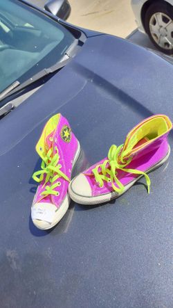 neon pink and yellow Converse Chuck Taylor high-top