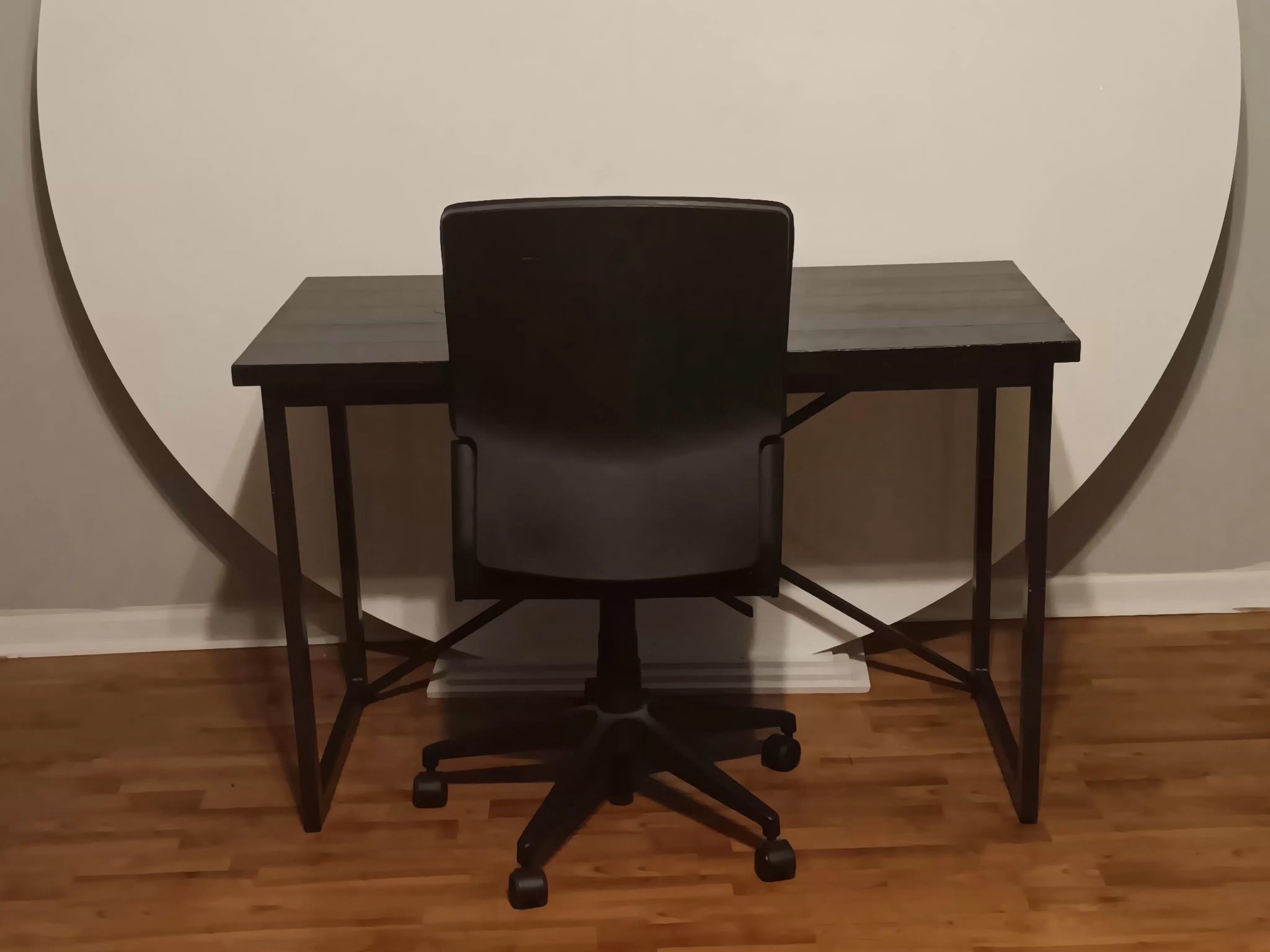 Black desk With Office Chair On Wheels