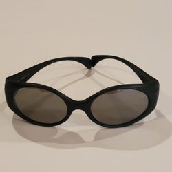 Vintage Bolle Puff Adder Sunglasses Wrap Made in France Black. 
Pre-owned, lenses have scratches. Frame has some scuffs.
