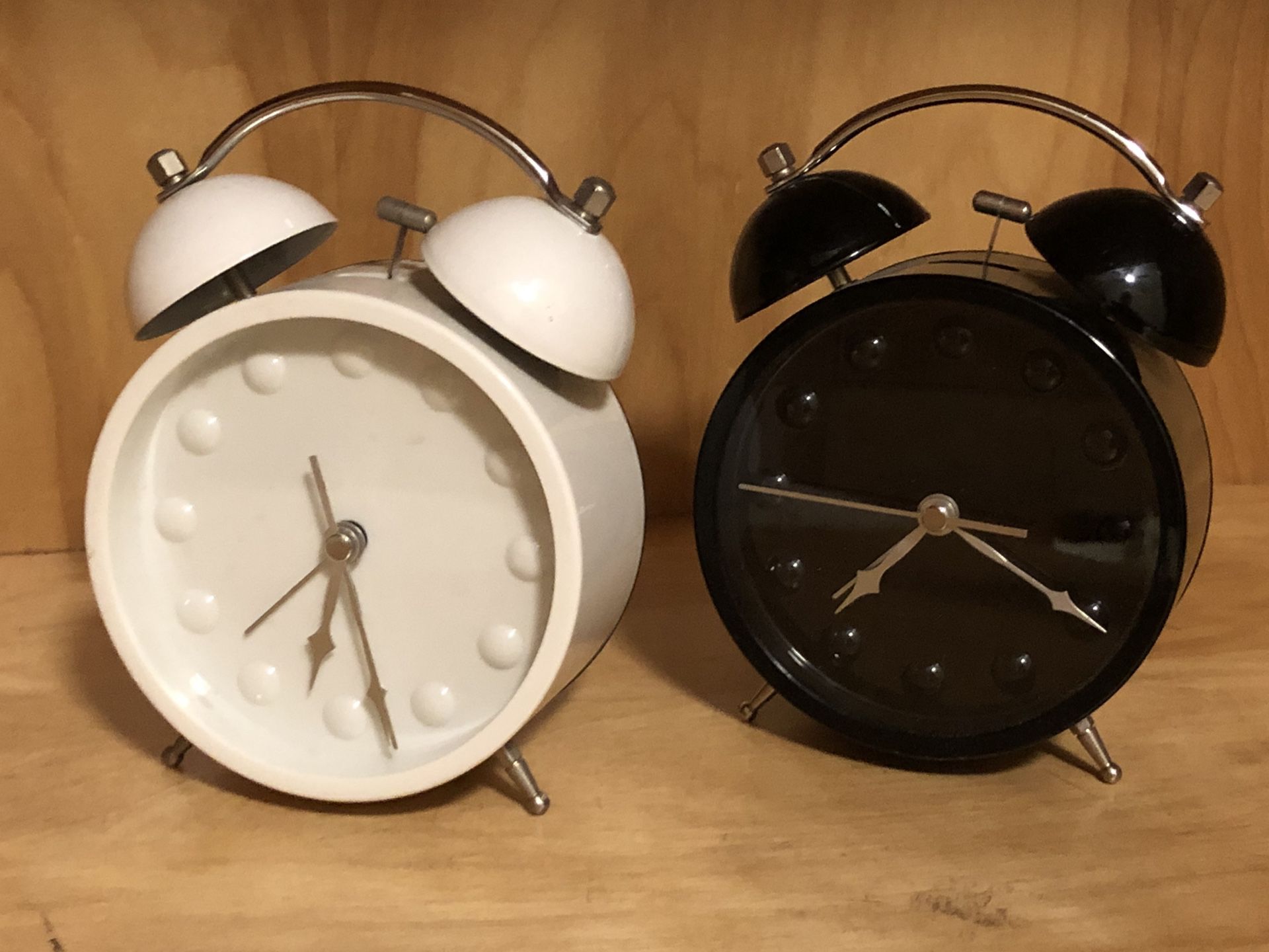Two old fashioned Alarm Clocks