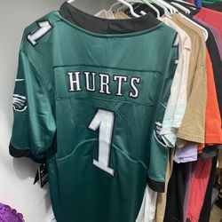Jaylen Hurts
 EAGLES
 New NFL Stitched Jersey
  Shipping Available 3.49 at checkout 
  Size Large Or XL

Located in pompano beach, shipping available 