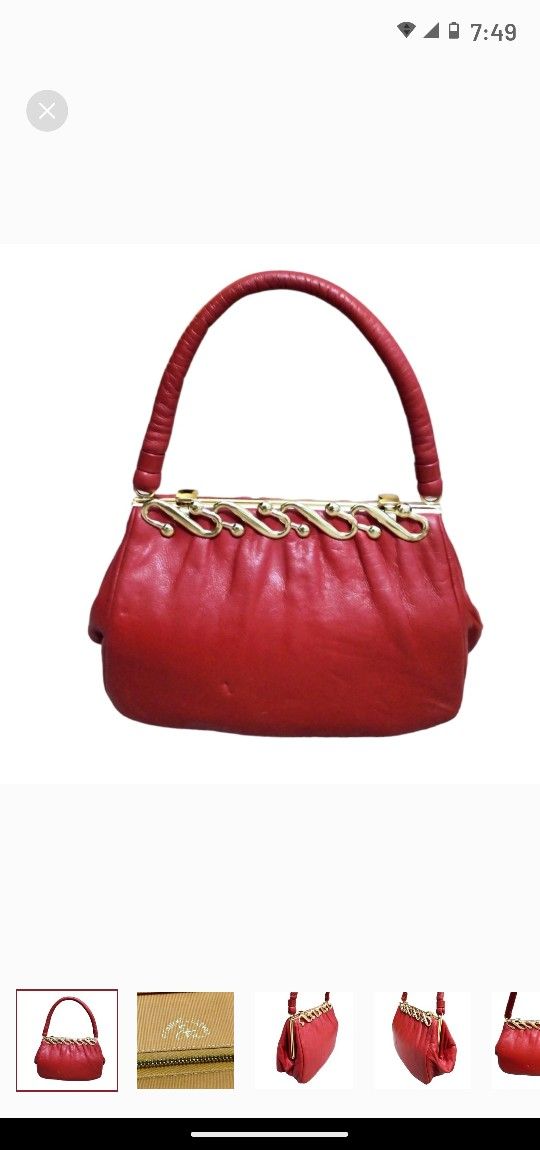 Etra Red Gunine Leather Bag.