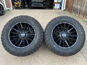 20x10 INCH XTREME MUDDER OFF-ROAD RIMS WITH 35x12.50R20 TIRES PRACTICALLY NEW