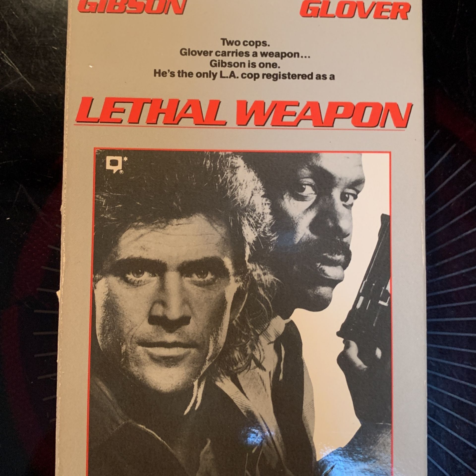 V-4. Lethal Weapon. $2. Mel Gibson., Danny Glover