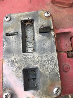 Late teens? curbside gas pump.