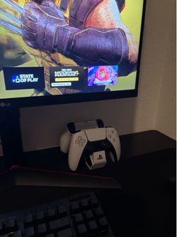PS5 charging station and 2 controllers