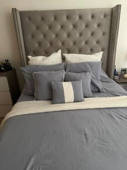 Bed with Upholstered Headboard
