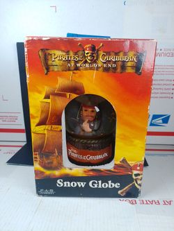 PIRATES OF THE CARIBBEAN JACK SPARROW SNOW GLOBE - THEME PARK EXCLUSIVE