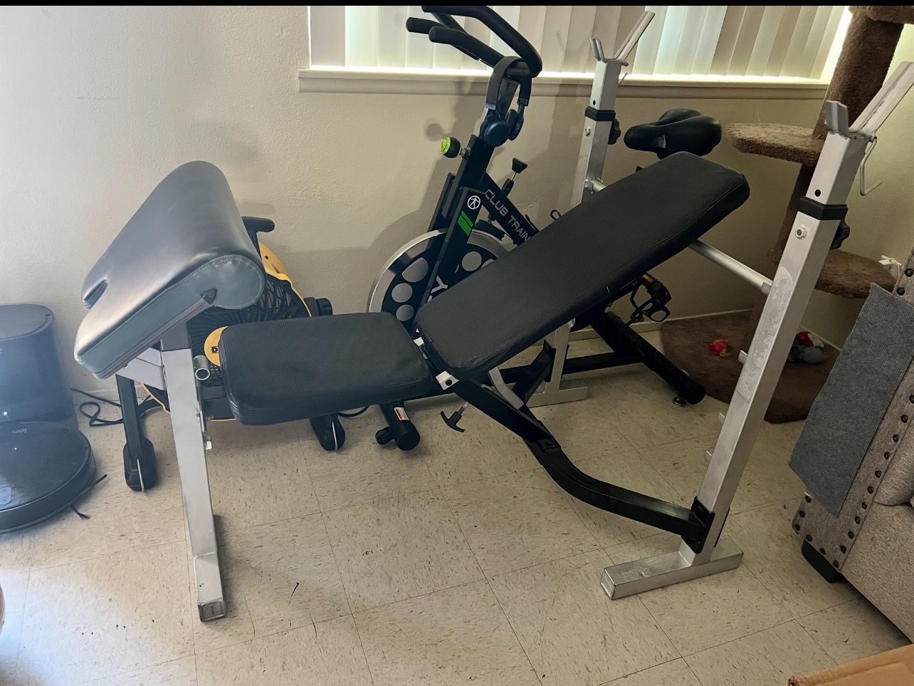 spinning bike and weight table together