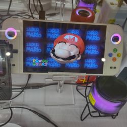 Consola 7 Pulgadas De Pantalla Mas De 20 Mil Juegos Retro