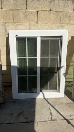 White Vinyl Sliding Window with Grid
