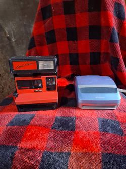 2 vintage Polaroid cameras