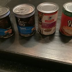4 Cans Of Dog Food 