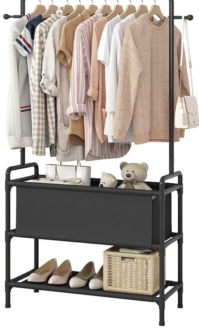 Garment rack with storage still in box needs to be assembled