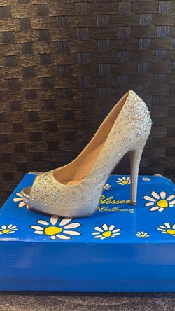 Silver high heels, size 7 1/2